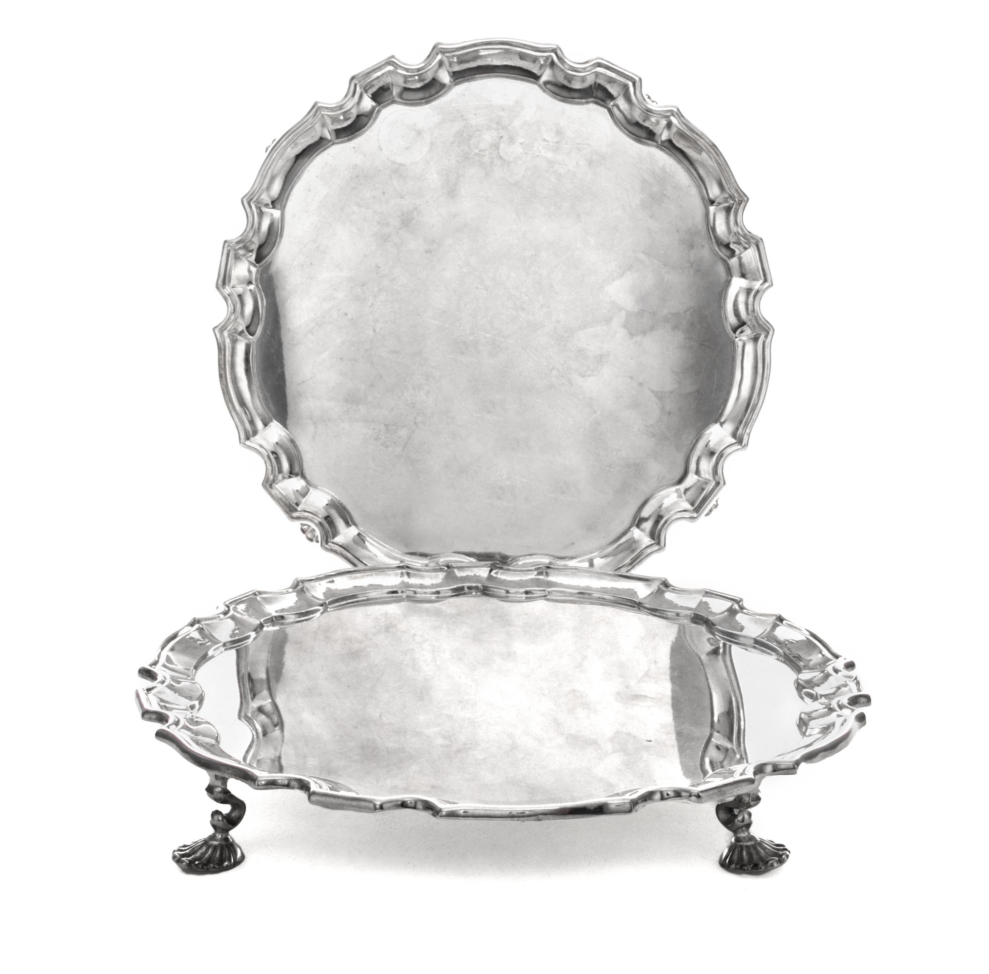 A Pair of American Silver-Plate Salvers, Gorham Mfg. Co., Providence, RI, each of circular form with pie-crust edge, raised on four she