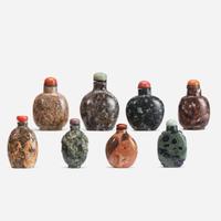 A group of eight Chinese assorted conglomerate and patterned stone snuff bottles