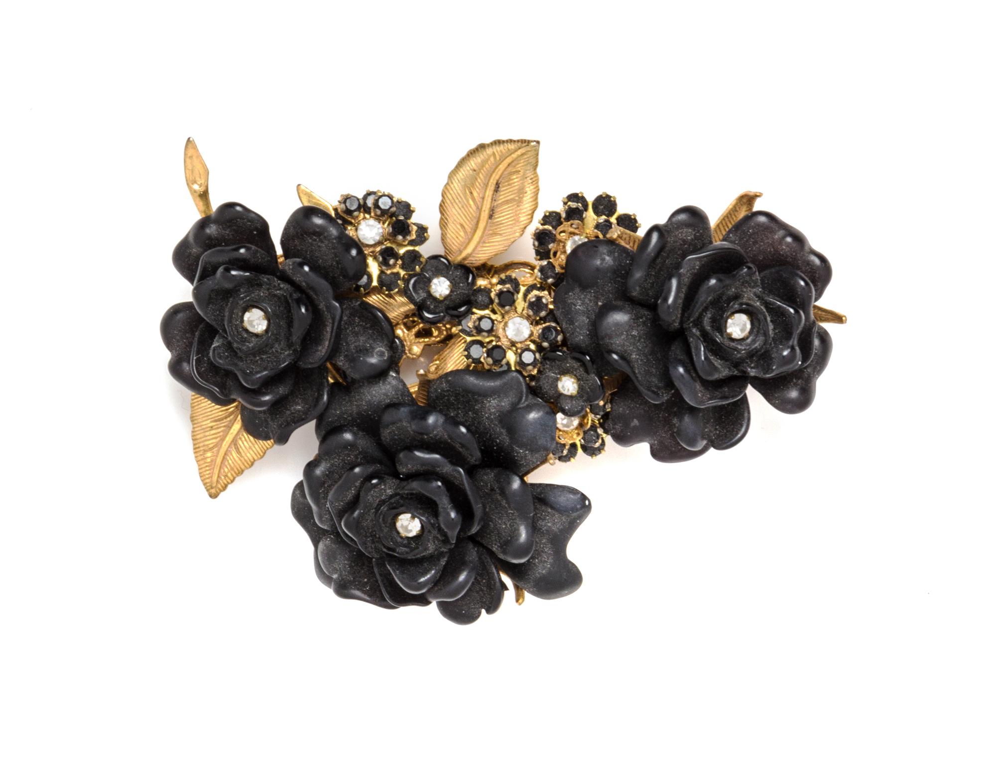 A Stanley Hagler Black Floral Brooch,