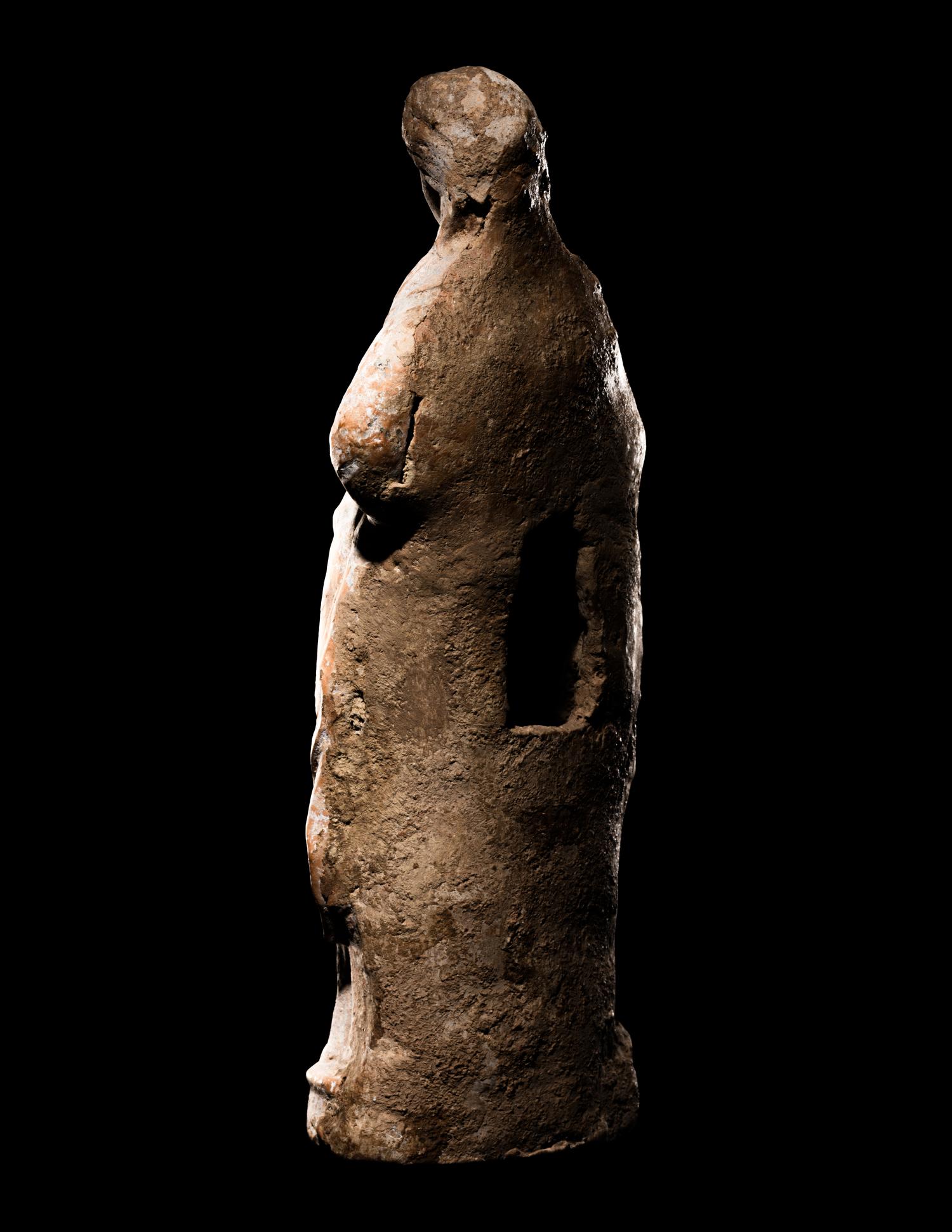 A Greek Terracotta Standing Draped Female Deity