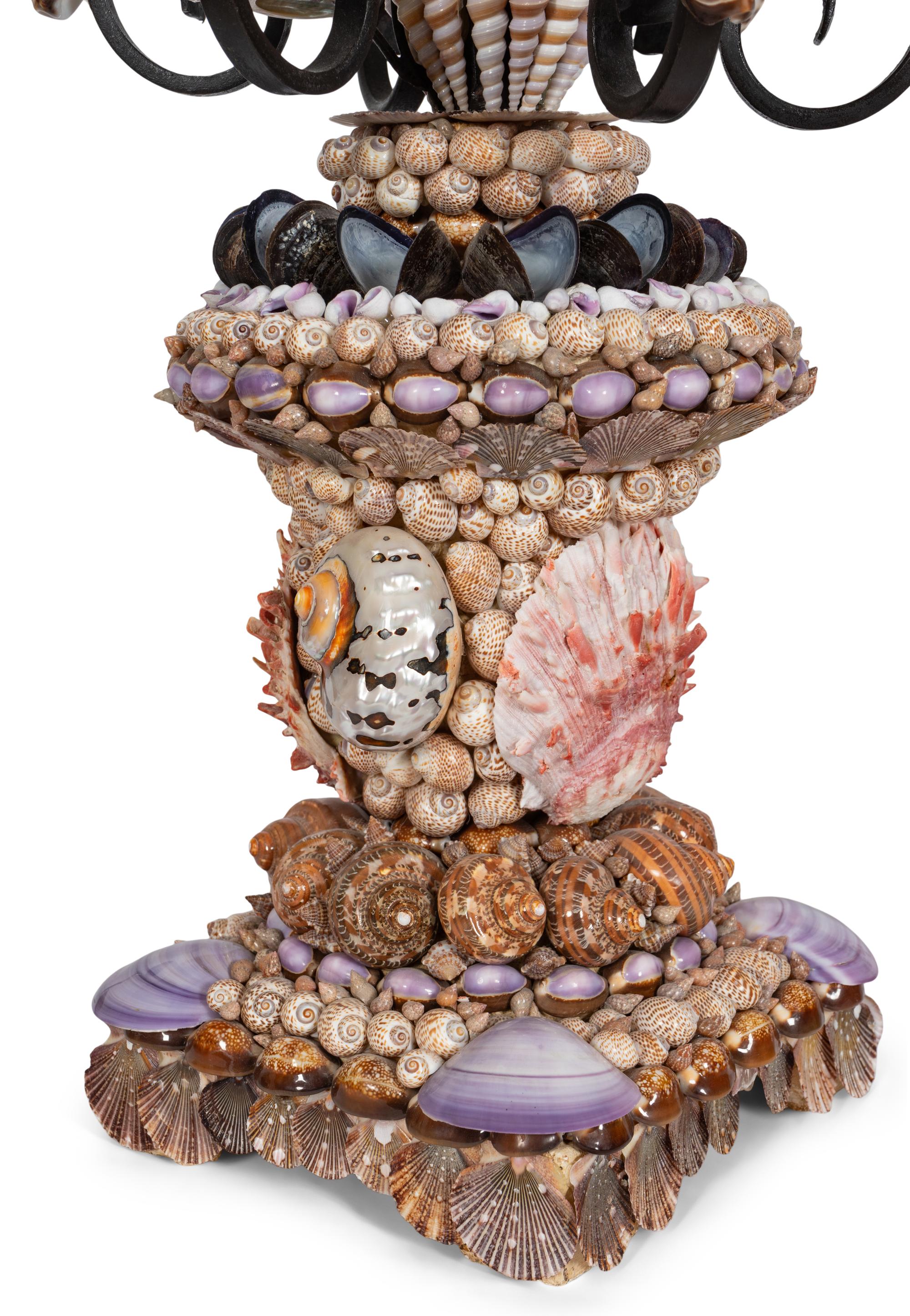 A Pair of Large Grotto Style Wrought Iron Shell Encrusted Seven-Light Candelabras