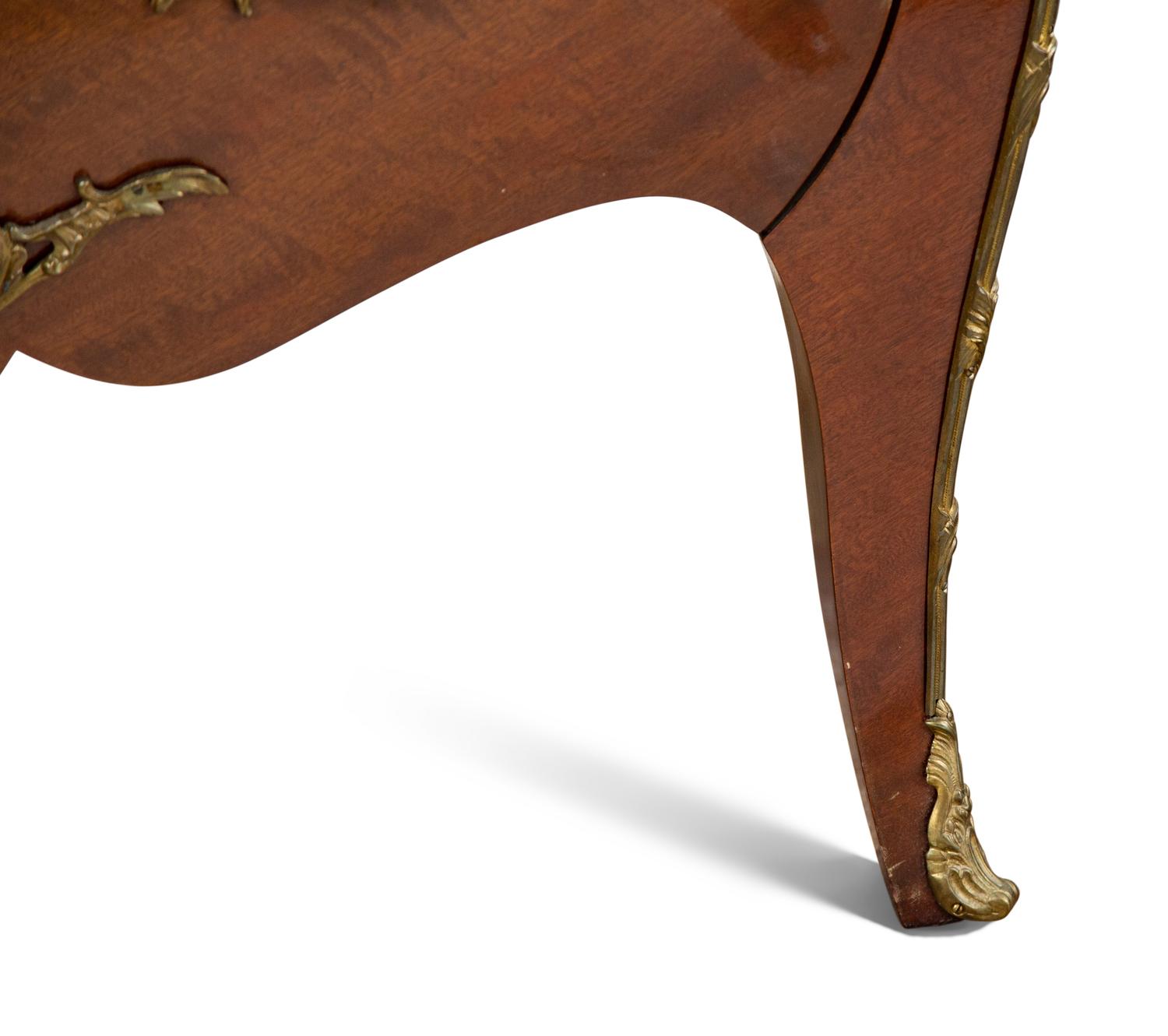 A Pair of Louis XV Style Mahogany Commodes