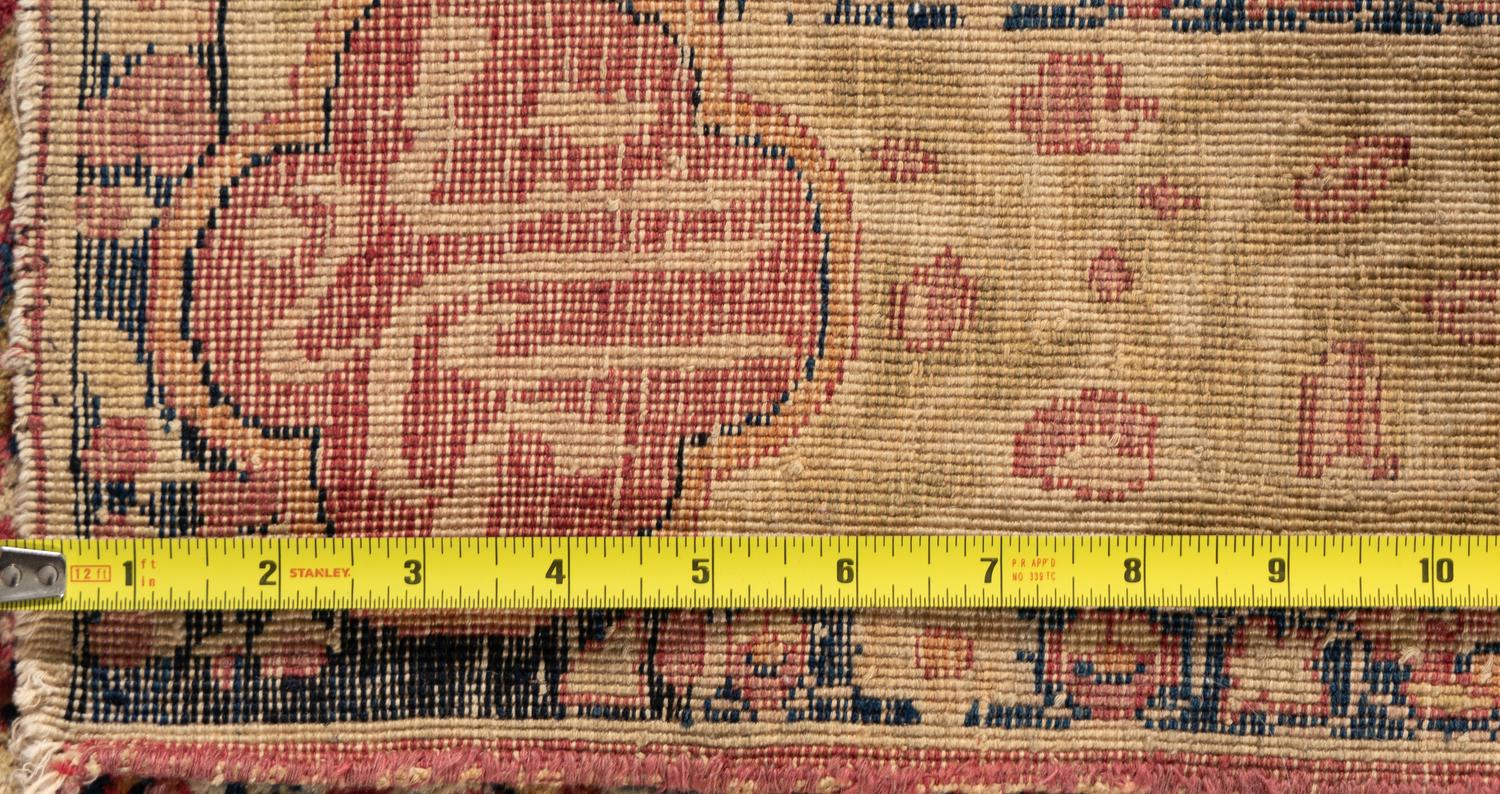 A Kermanshah Wool Rug with Poetic Inscription