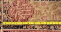 A Kermanshah Wool Rug with Poetic Inscription
