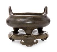 A Chinese Bronze Tripod Censer with Stand Height overall 7 1/2 inches.