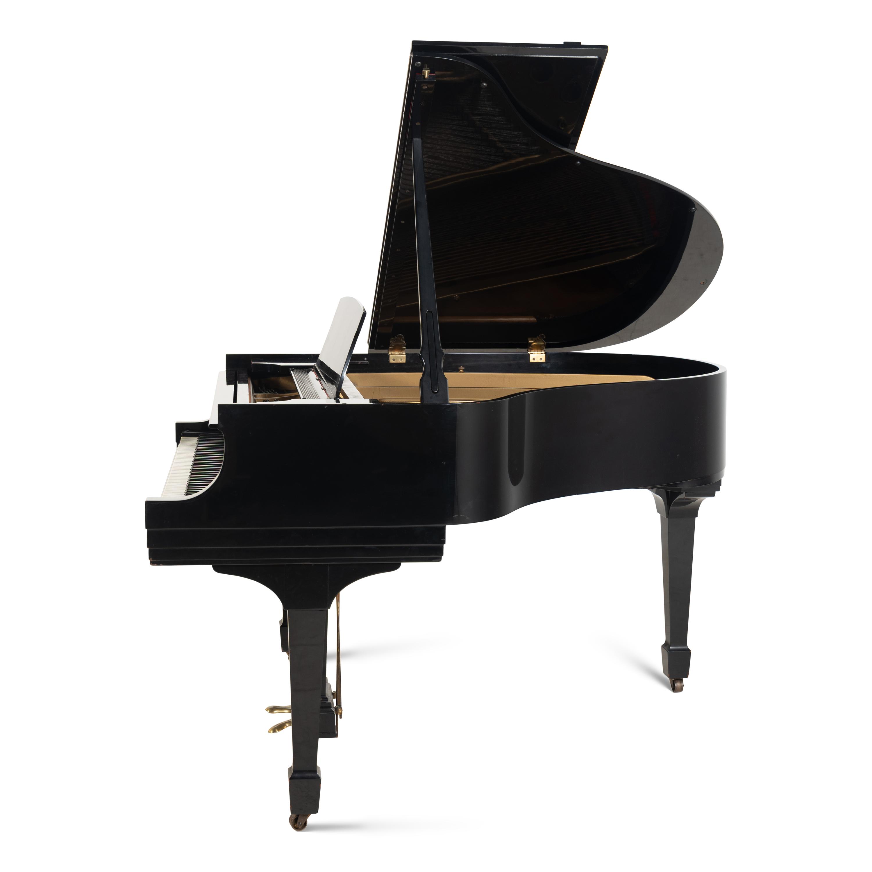 A Steinway and Sons Baby Grand Piano
