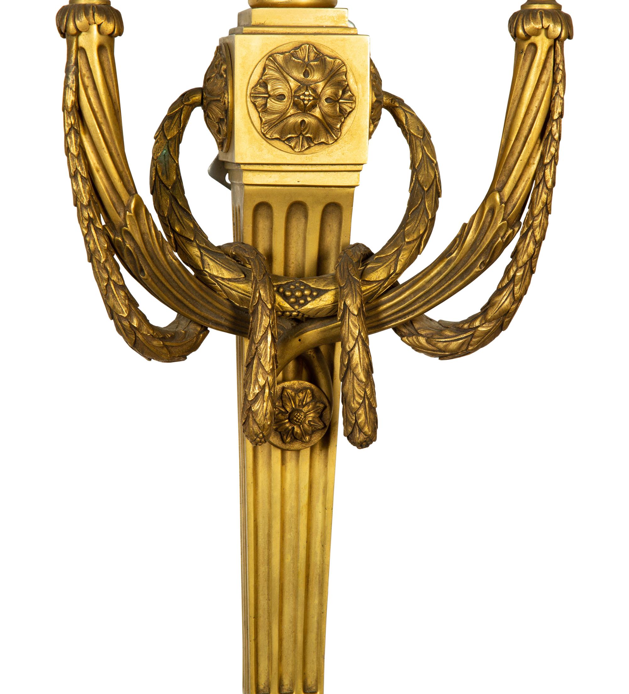 A Pair of Louis XVI Style Gilt Bronze Two-Light Sconces