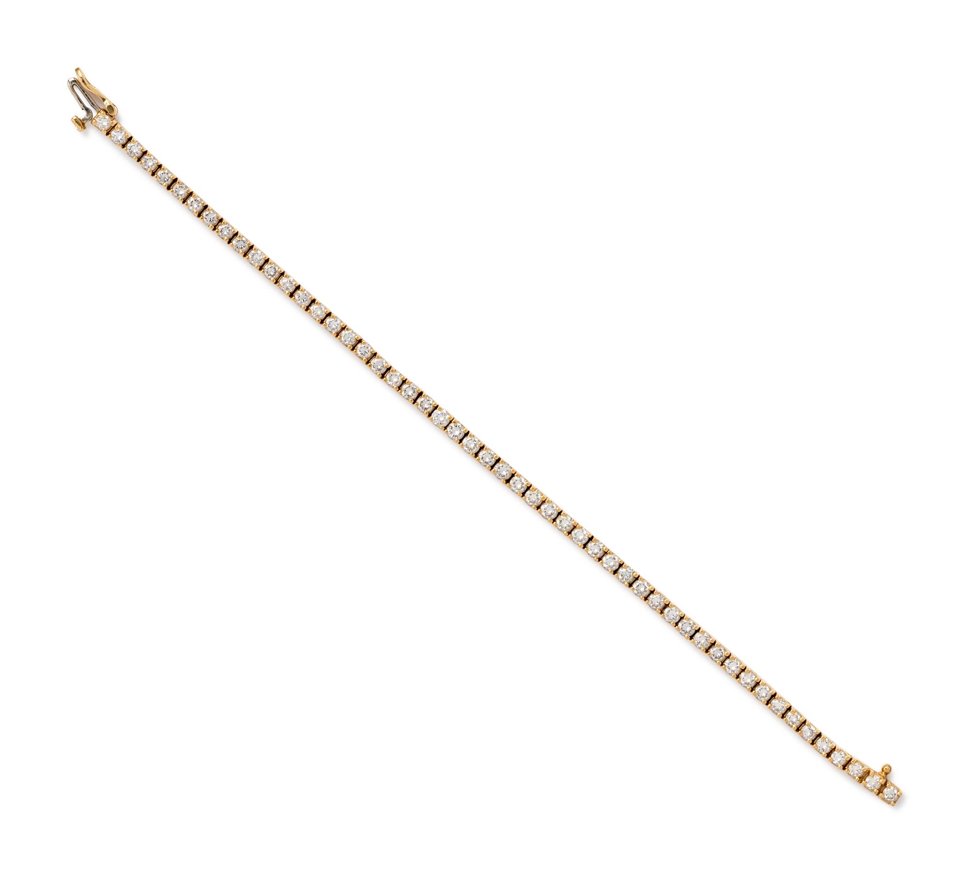 A 14 Karat Yellow Gold and Diamond Bracelet,