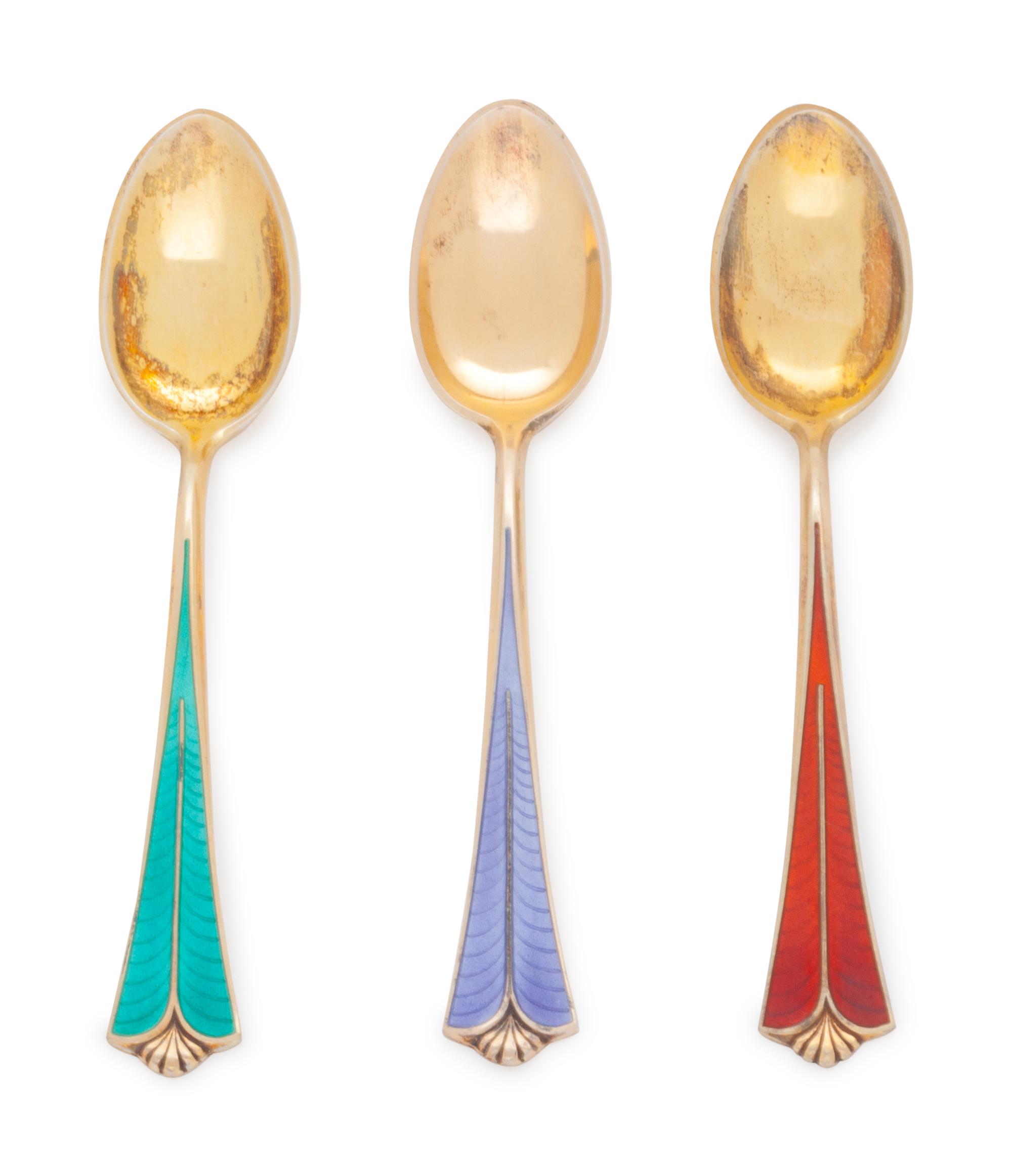 each with enamel handle, varying colors.