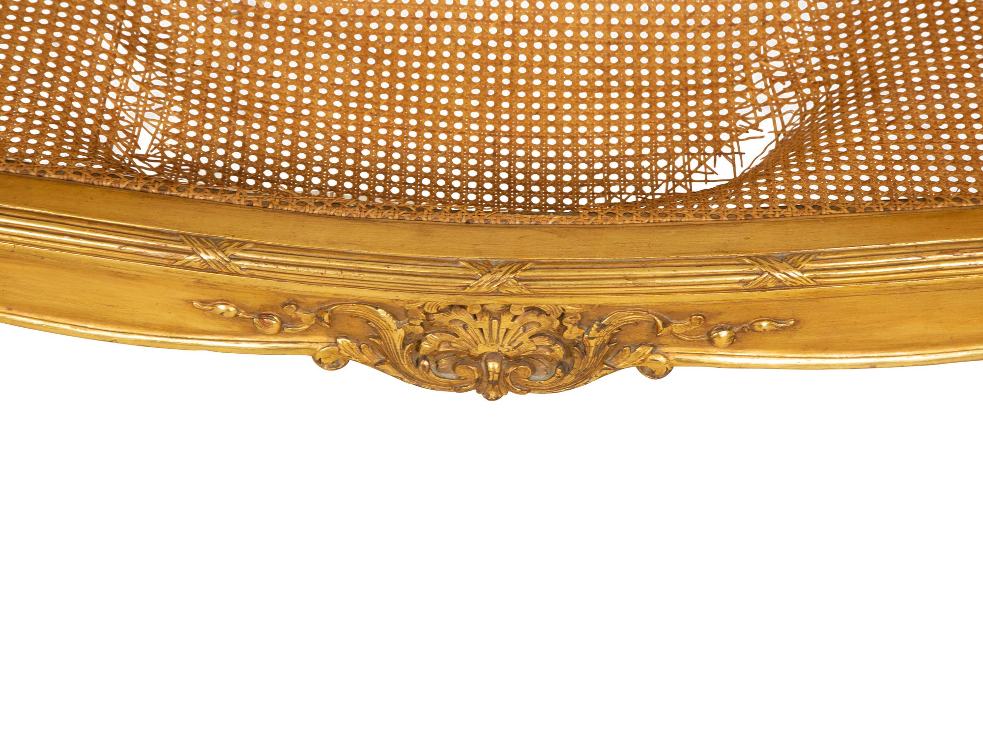 A Louis XV Style Caned Giltwood Settee