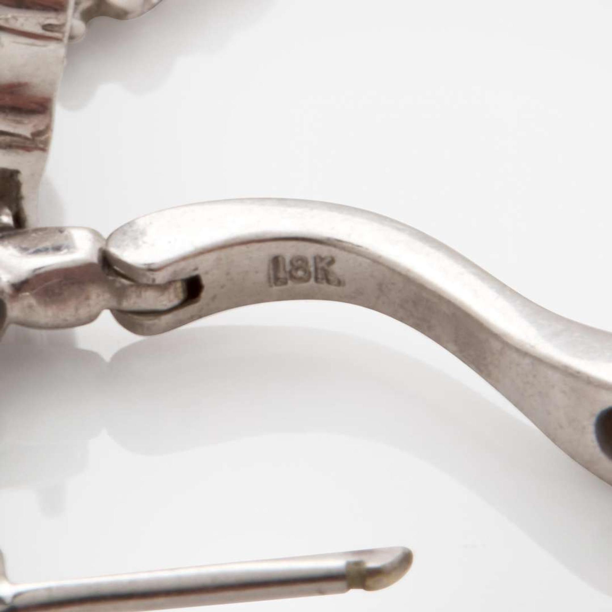 A Pair of 18K White Gold and Diamond Earrings