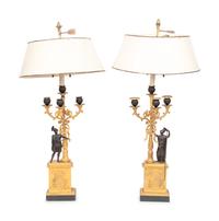 A Pair of Empire Gilt and Patinated Bronze Four-Light Candelabra