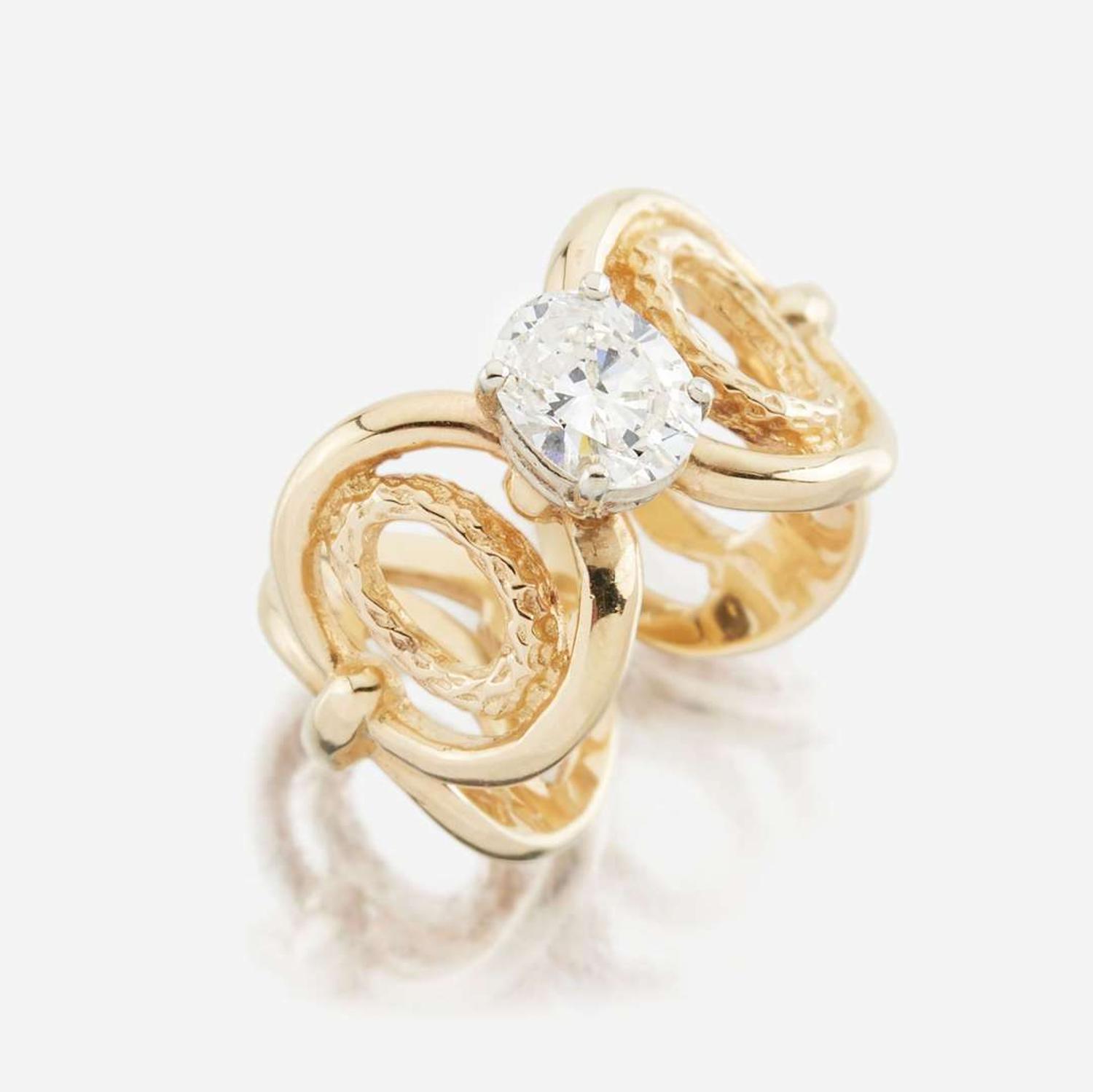 A diamond and gold ring