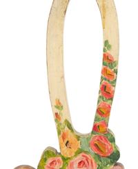 A Victorian Painted Iron Greyhound Doorstop and a Painted Wood Basket Doorstop