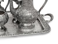 An American Silver Repoussé Seven-Piece Tea and Coffee Service