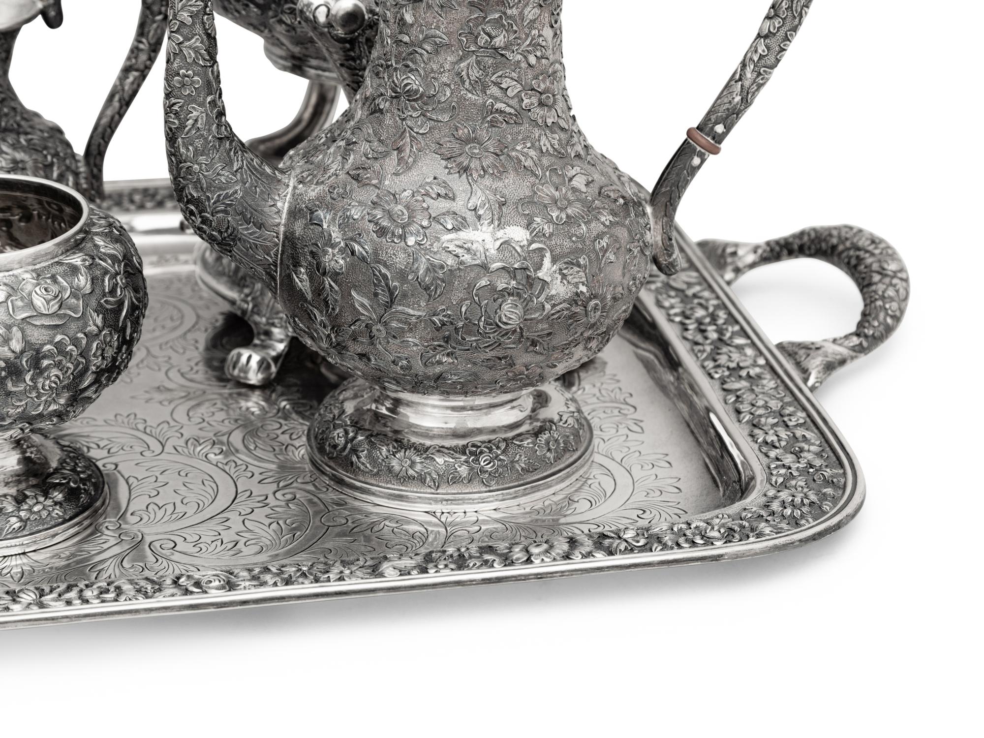 An American Silver Repoussé Seven-Piece Tea and Coffee Service