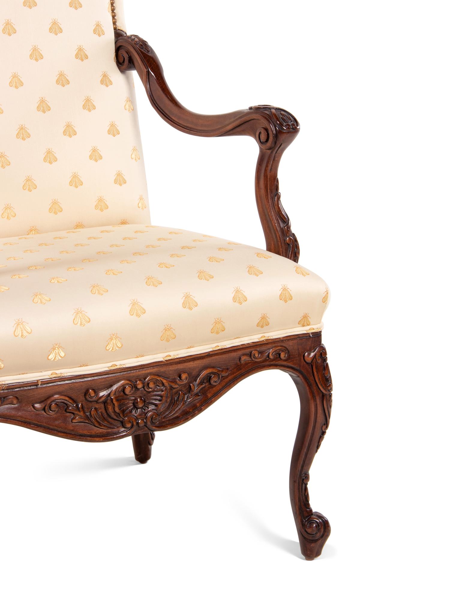 A Pair of Régence Style Walnut Armchairs