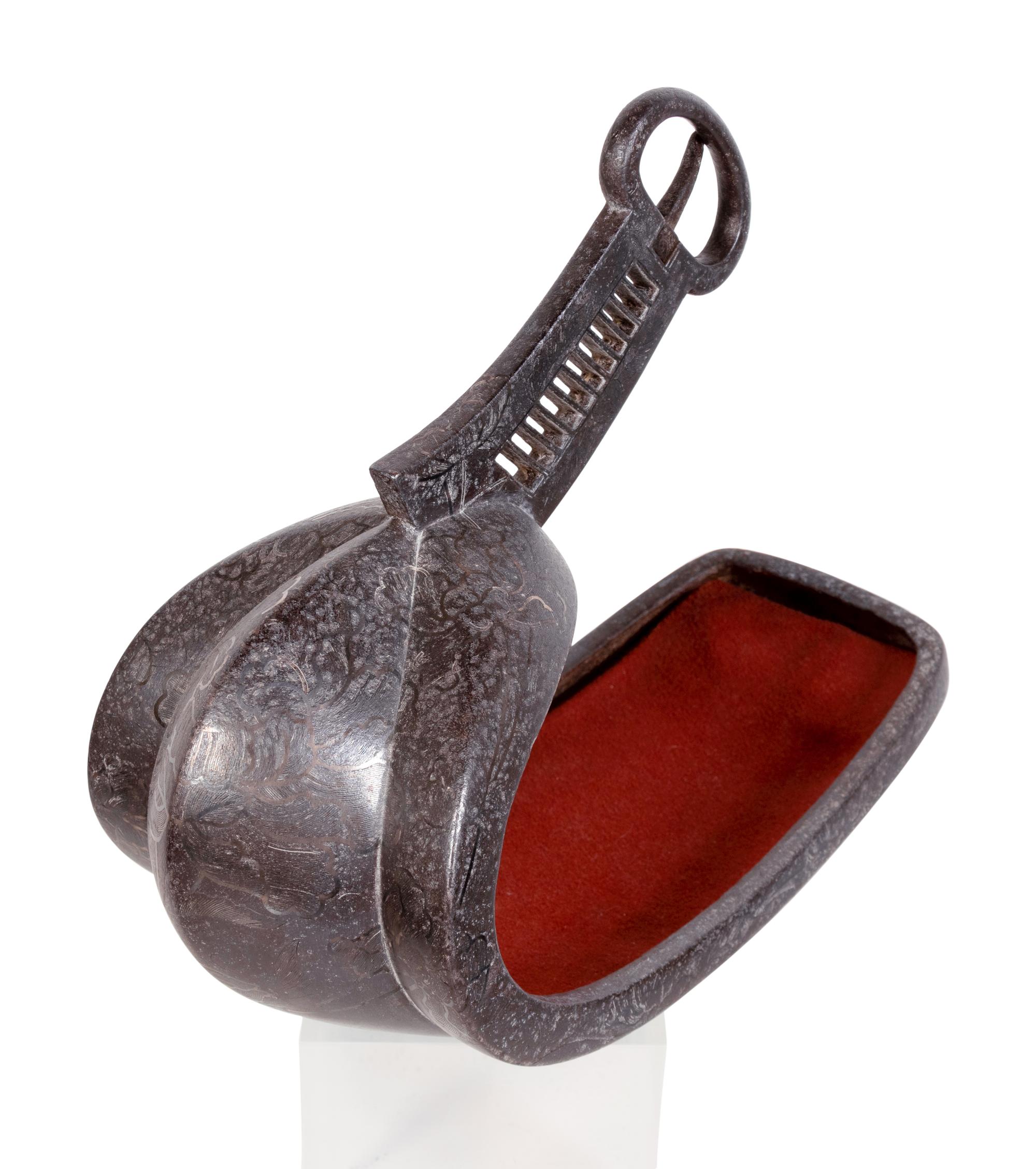 A Japanese Bronze Stirrup