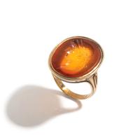 A Neoclassical Gold and Carnelian Finger Ring with a Male Portrait Head