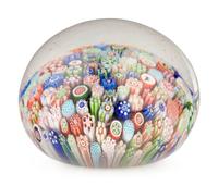 A Miniature Baccarat Close Packed Millefiori and Silhouette Glass Paperweight