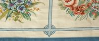 A Machine Made Floral Design Wool Rug