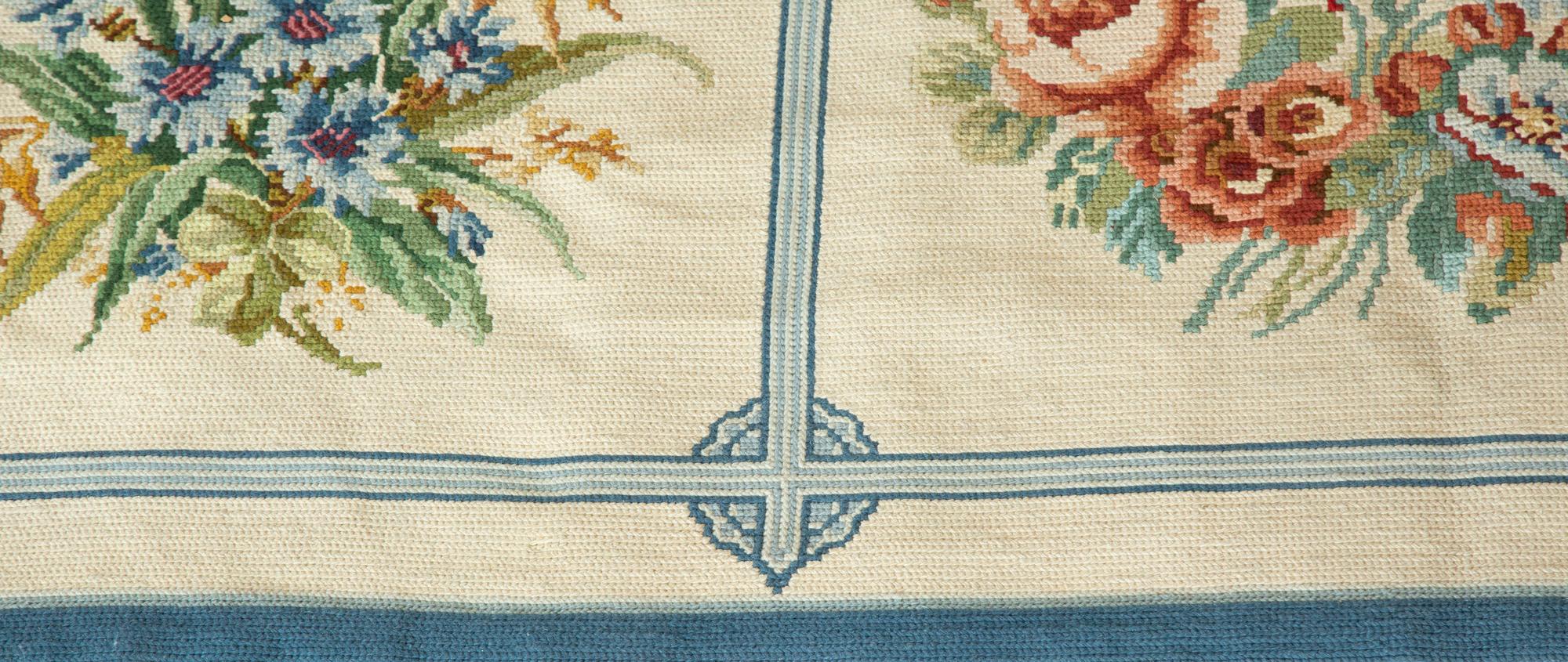 A Machine Made Floral Design Wool Rug