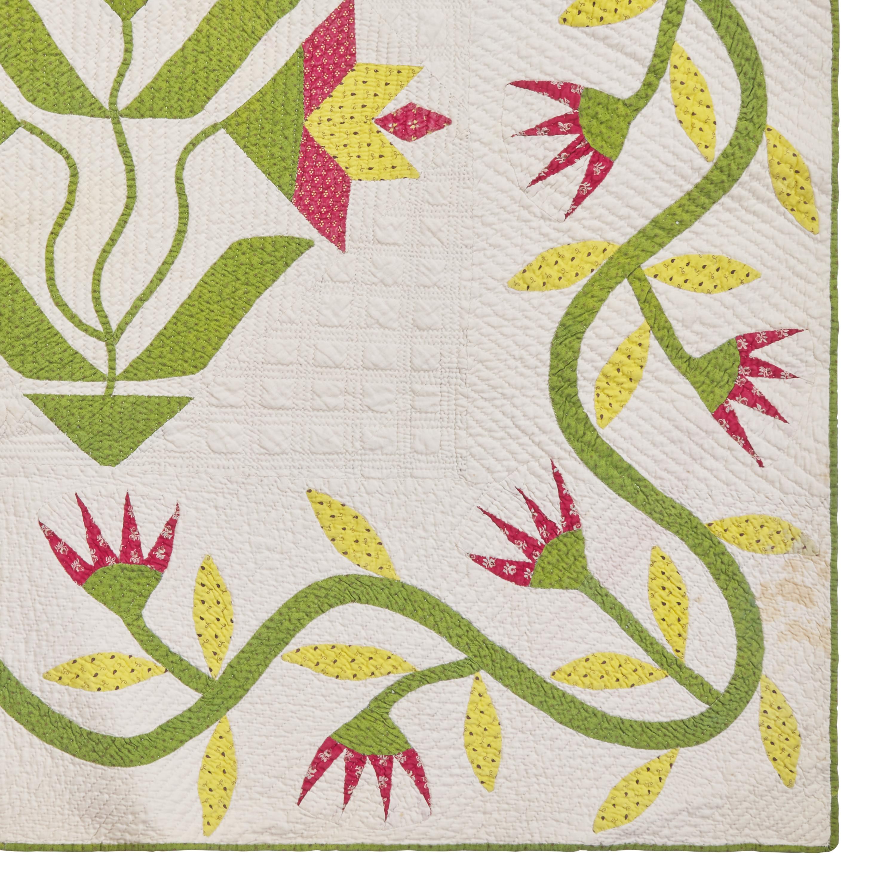 A Fine Pieced and Applique Printed Cotton Quilt