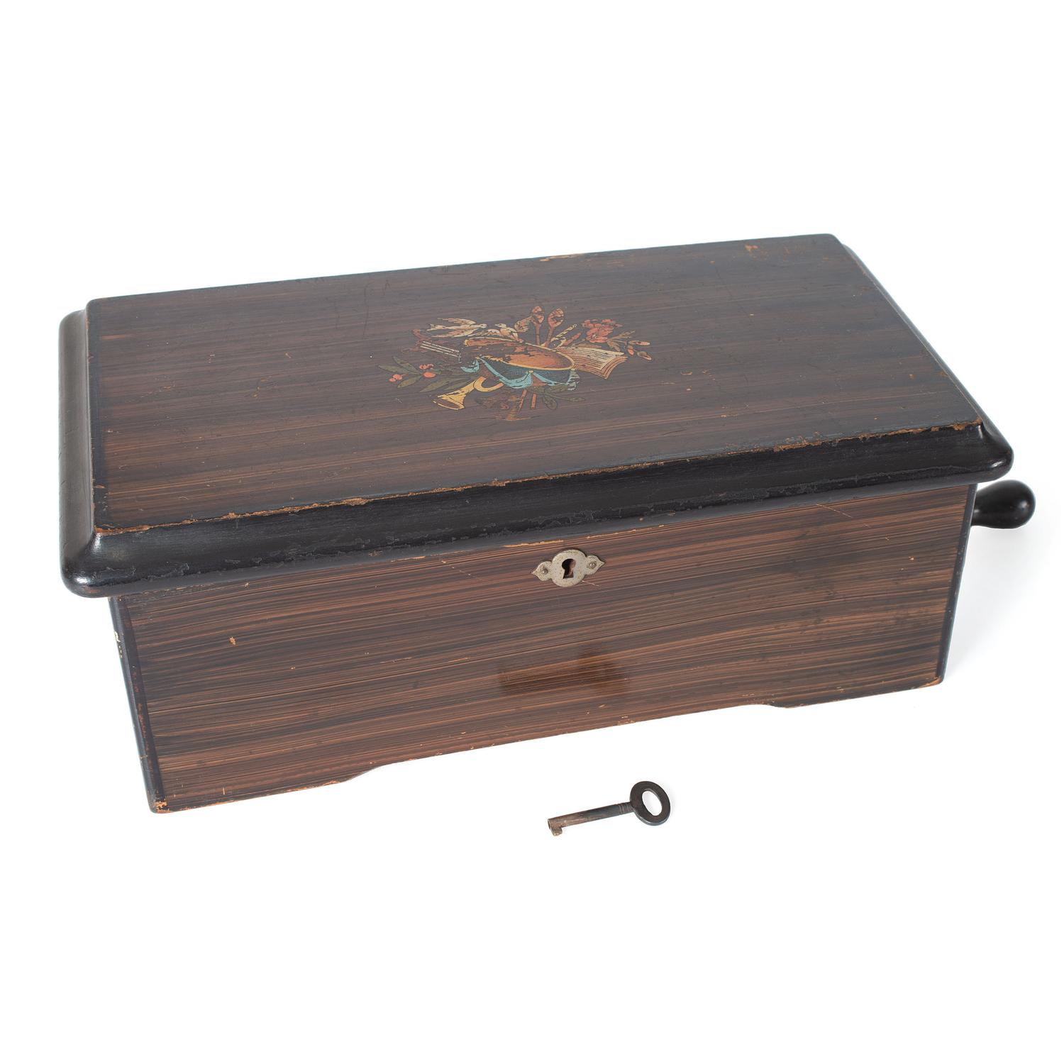 A Six Tune Cylinder Swiss Music Box with Rosewood Case