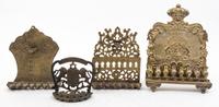 A Group of Seven Brass Menorahs Height of tallest 18 1/4 inches.