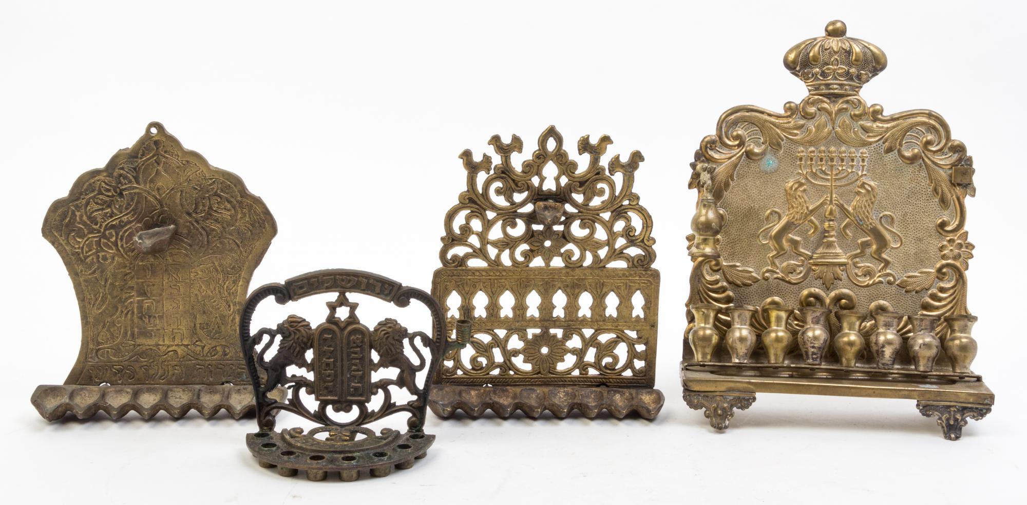 A Group of Seven Brass Menorahs Height of tallest 18 1/4 inches.