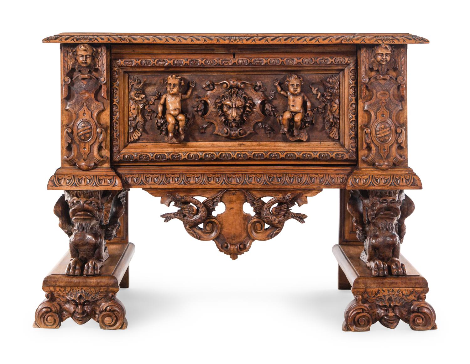An Italian Renaissance Revival Carved Walnut Cassone on Stand