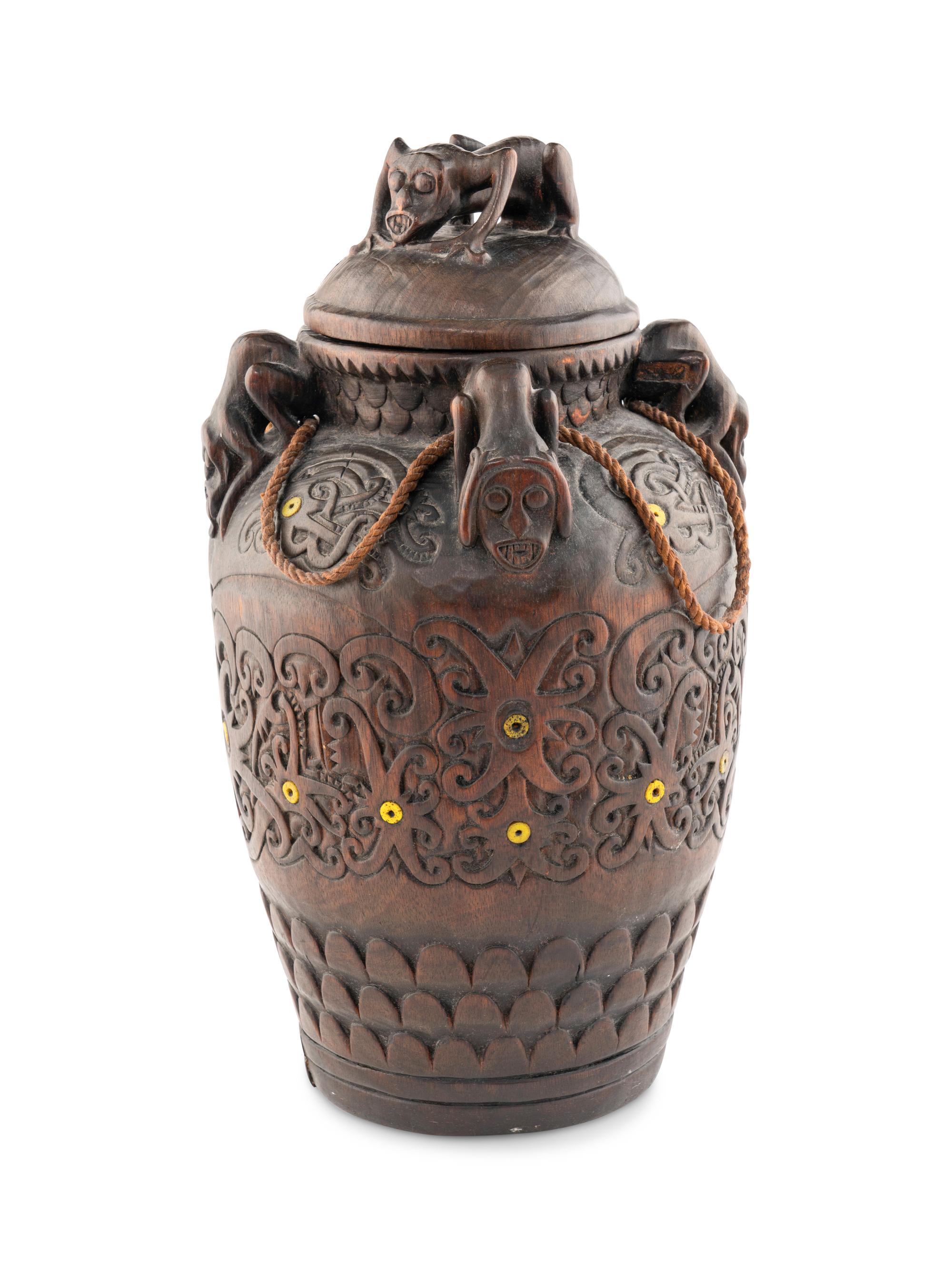 An Oceanic Carved Wood Lidded Vessel
