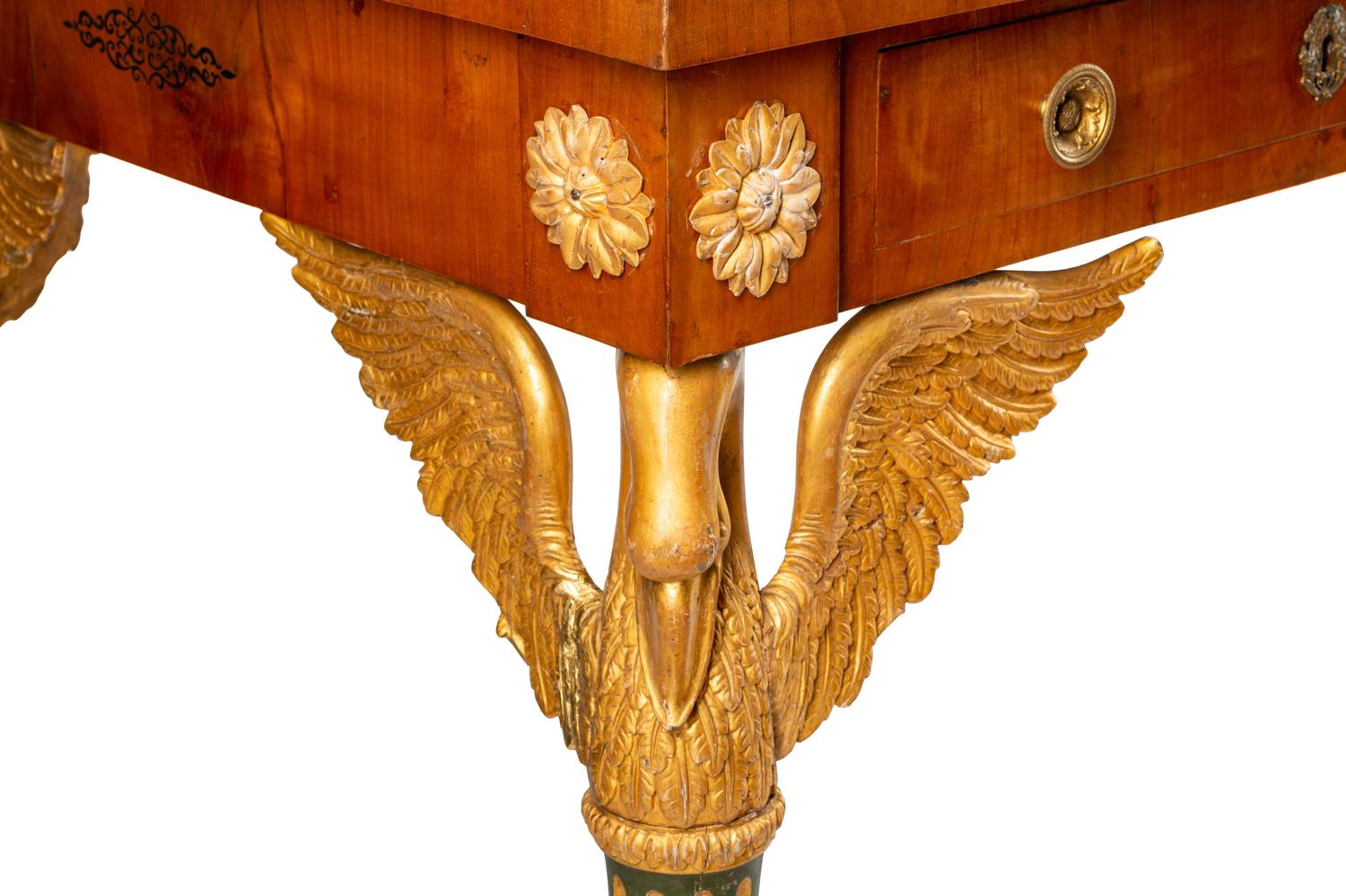 An Austrian Empire Style Fruitwood Veneered, Painted and Parcel Gilt Bureau Plat