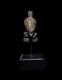 A Roman Bronze Eagle Perched on a Boar's Head