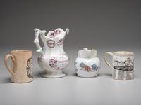 Two Commemorative Creamware Pitchers and Two Ale Mugs