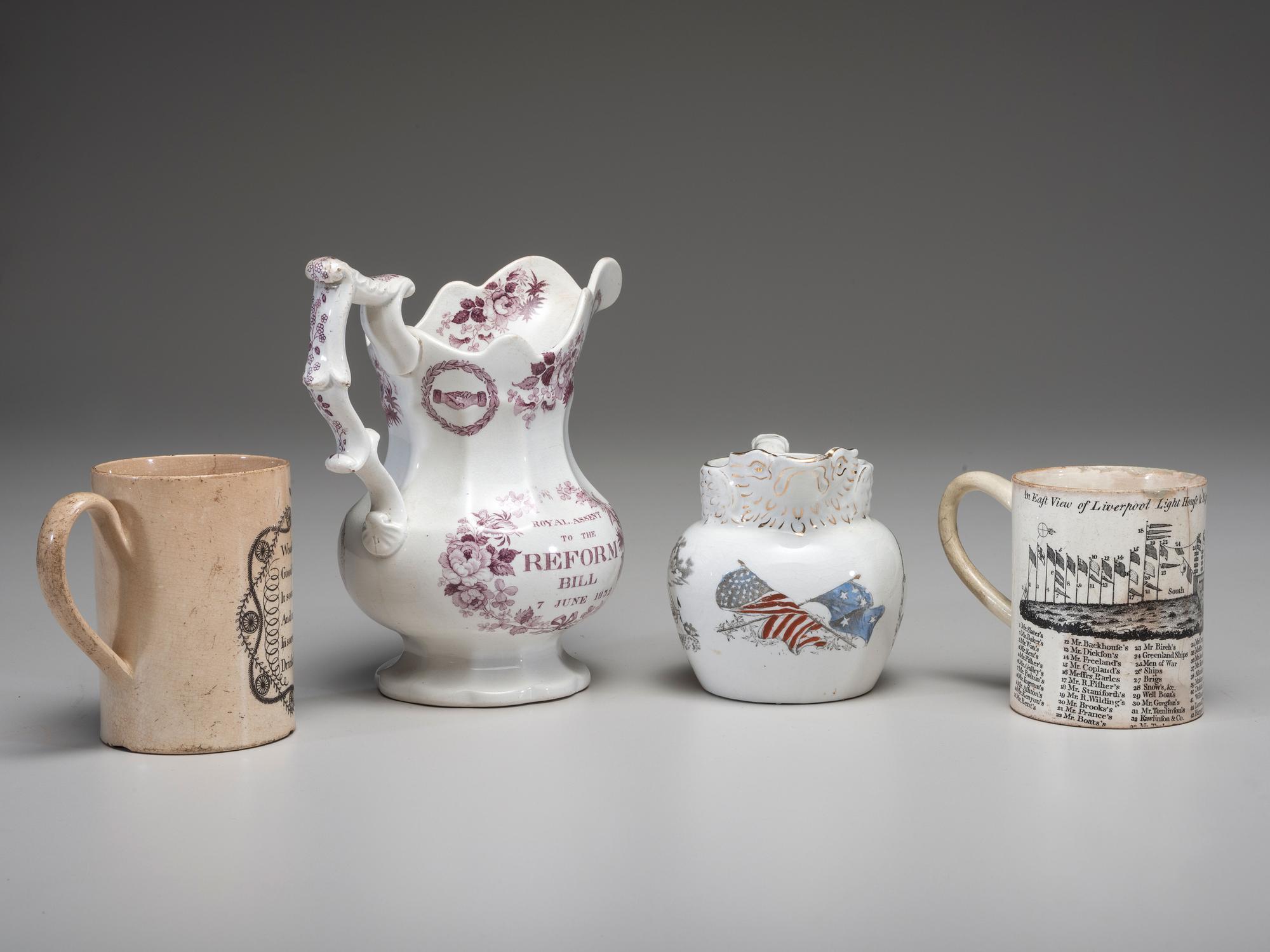 Two Commemorative Creamware Pitchers and Two Ale Mugs