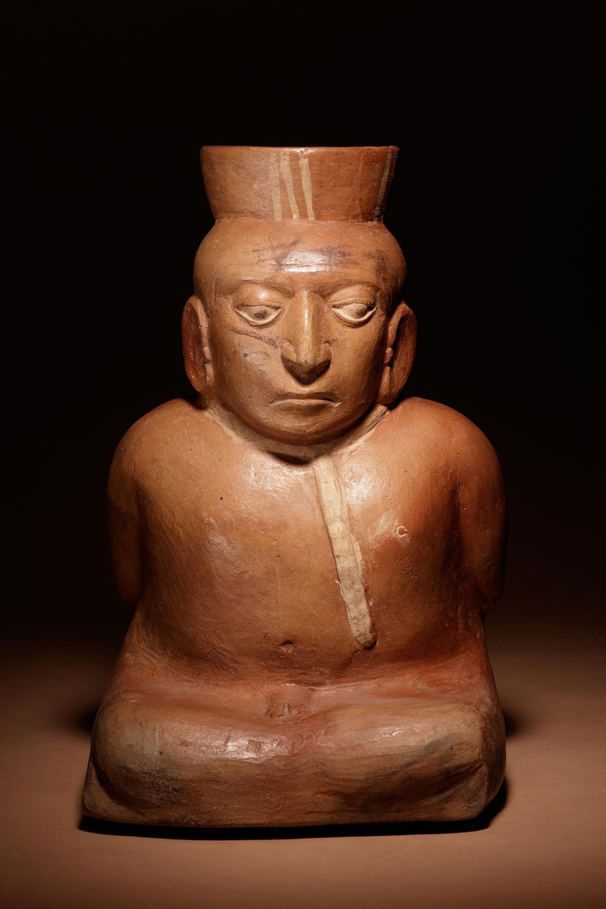 A Moche Terracotta Vessel Depicting a Bound Captive