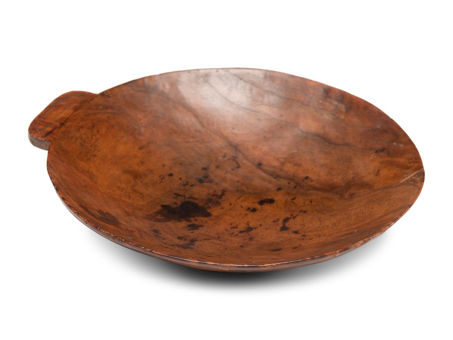 A Finely Polished Cherrywood Milk Skimmer