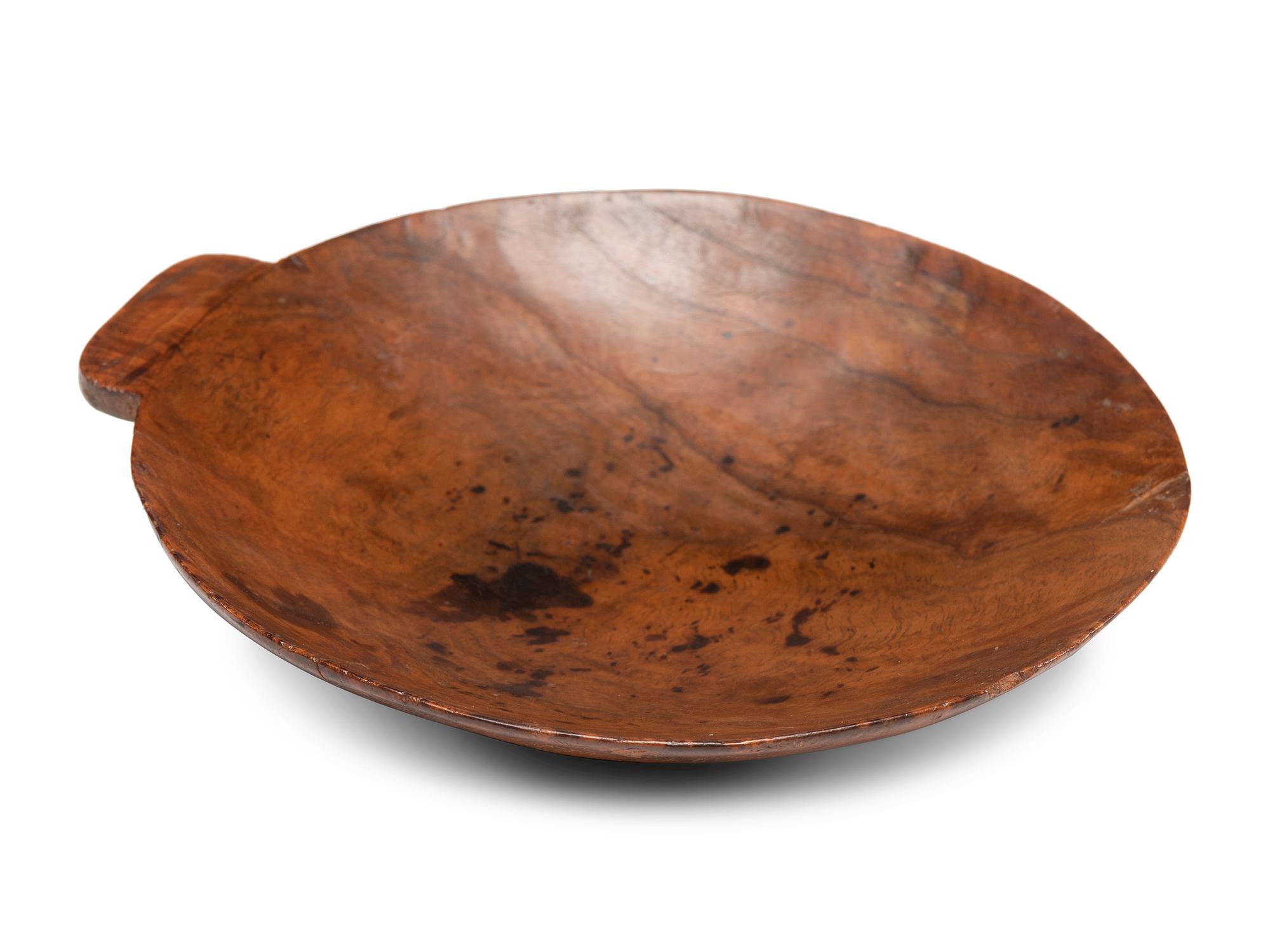 A Finely Polished Cherrywood Milk Skimmer
