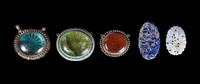 Seventy Chinese Hardstone and Glass Pendants