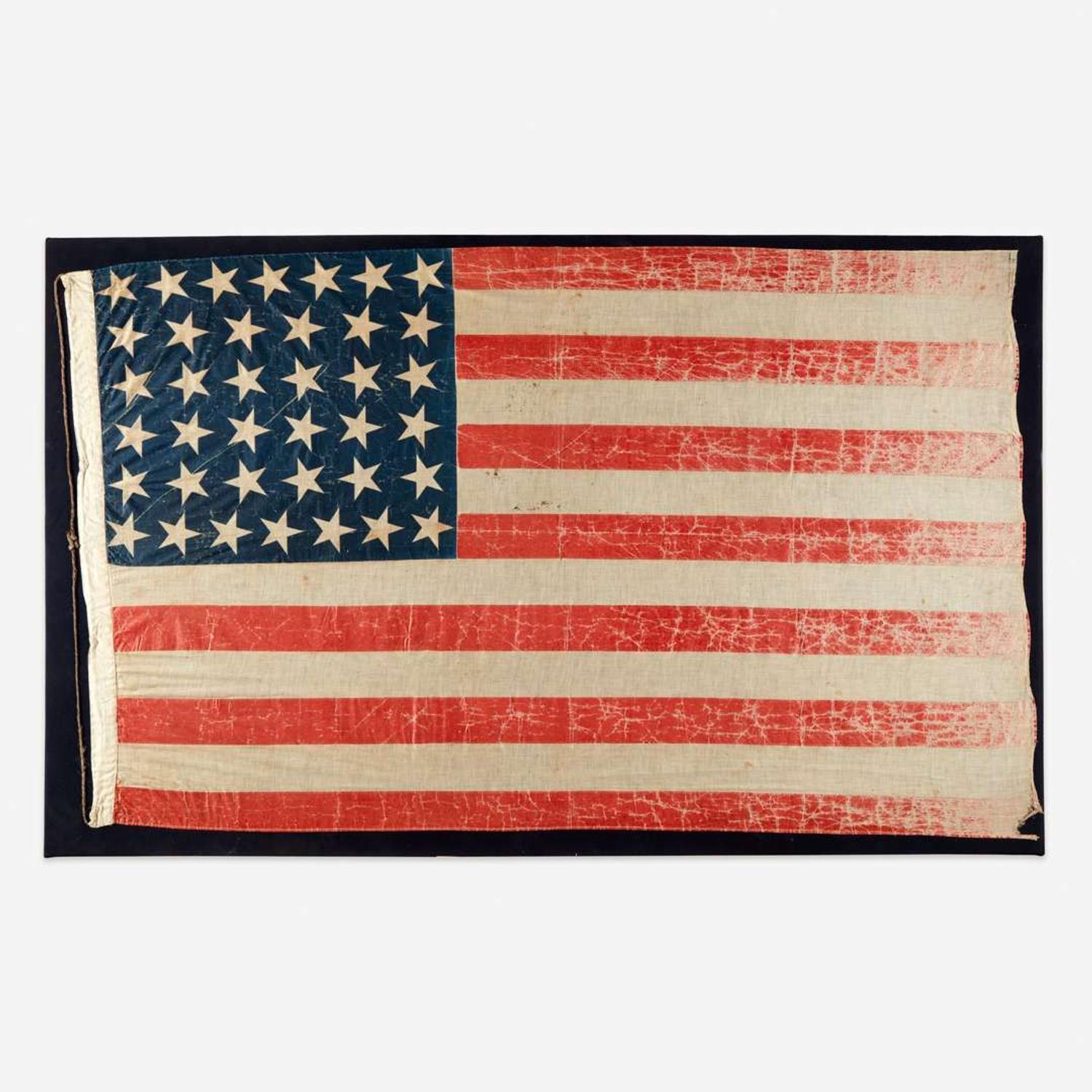 A 38-Star American National Parade Flag commemorating Colorado statehood 1876-1889