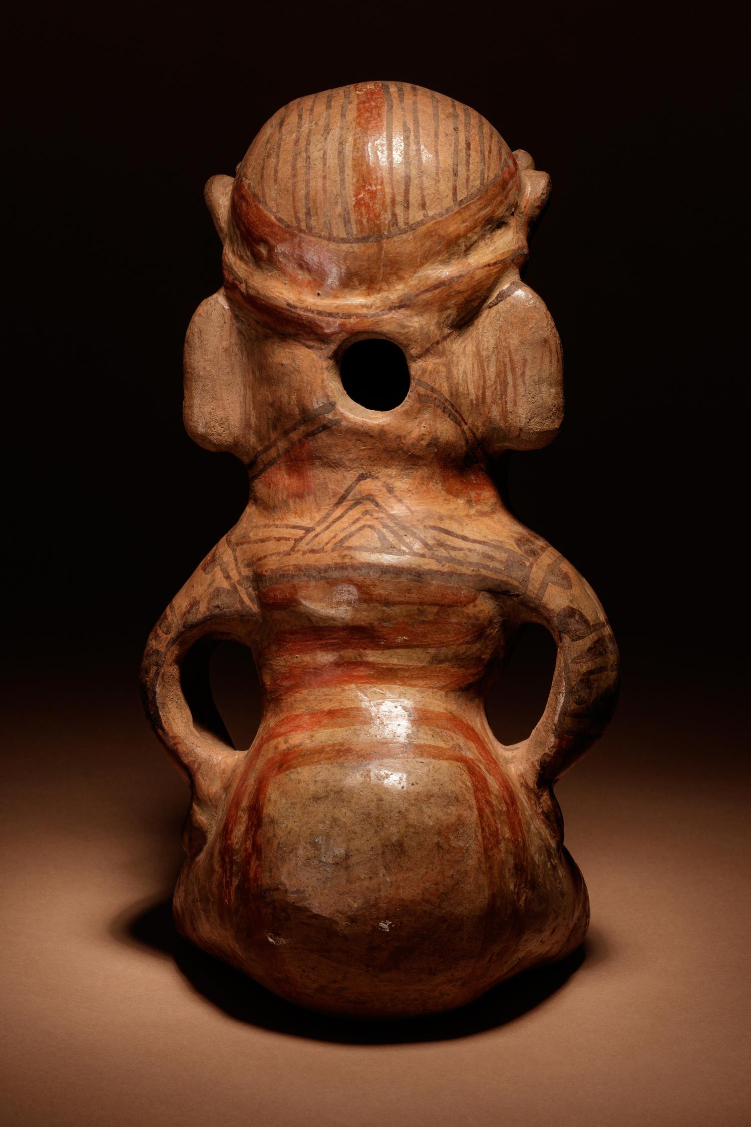 A Nicoya Polychrome Terracotta Seated Figure