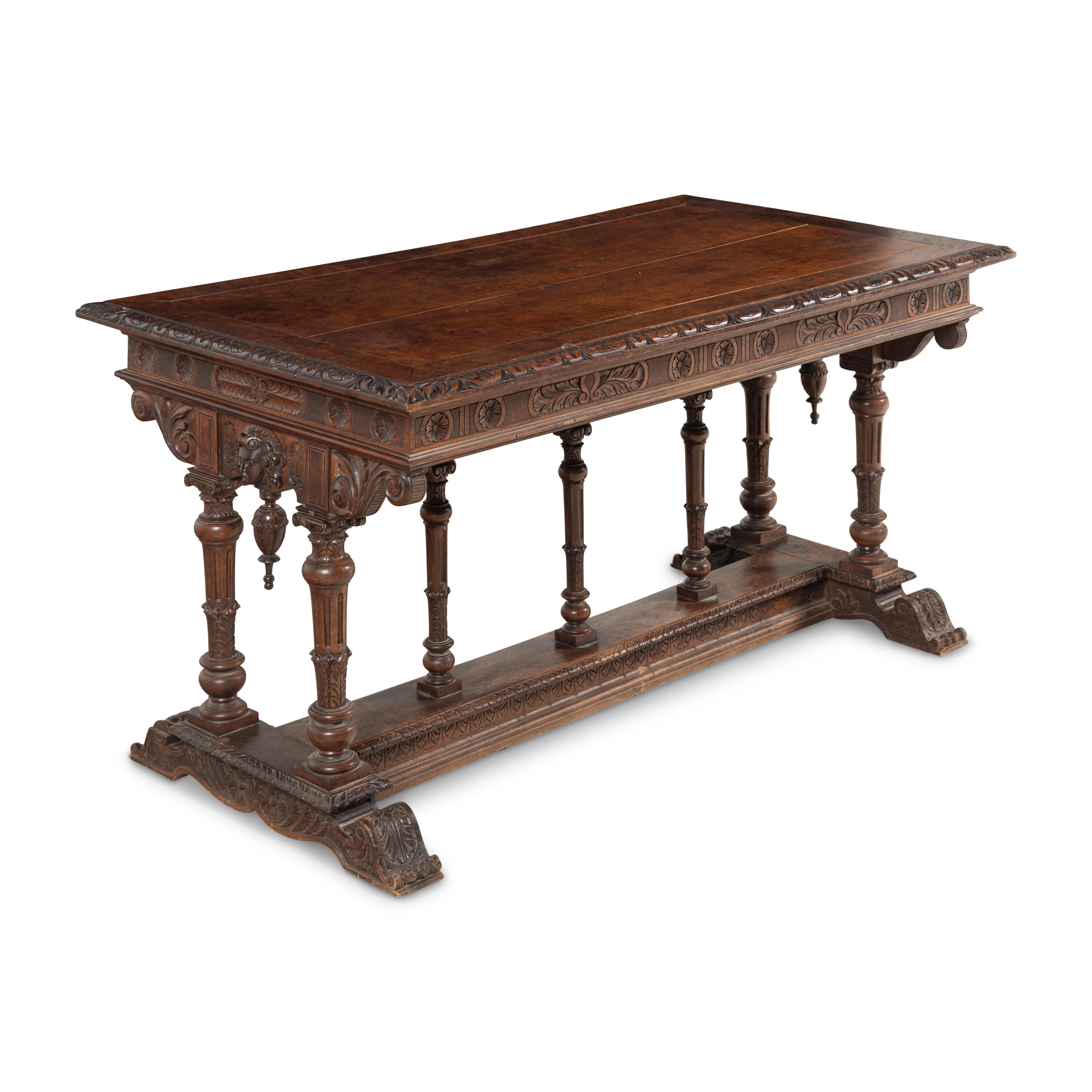 An Italian Carved Walnut Library Table