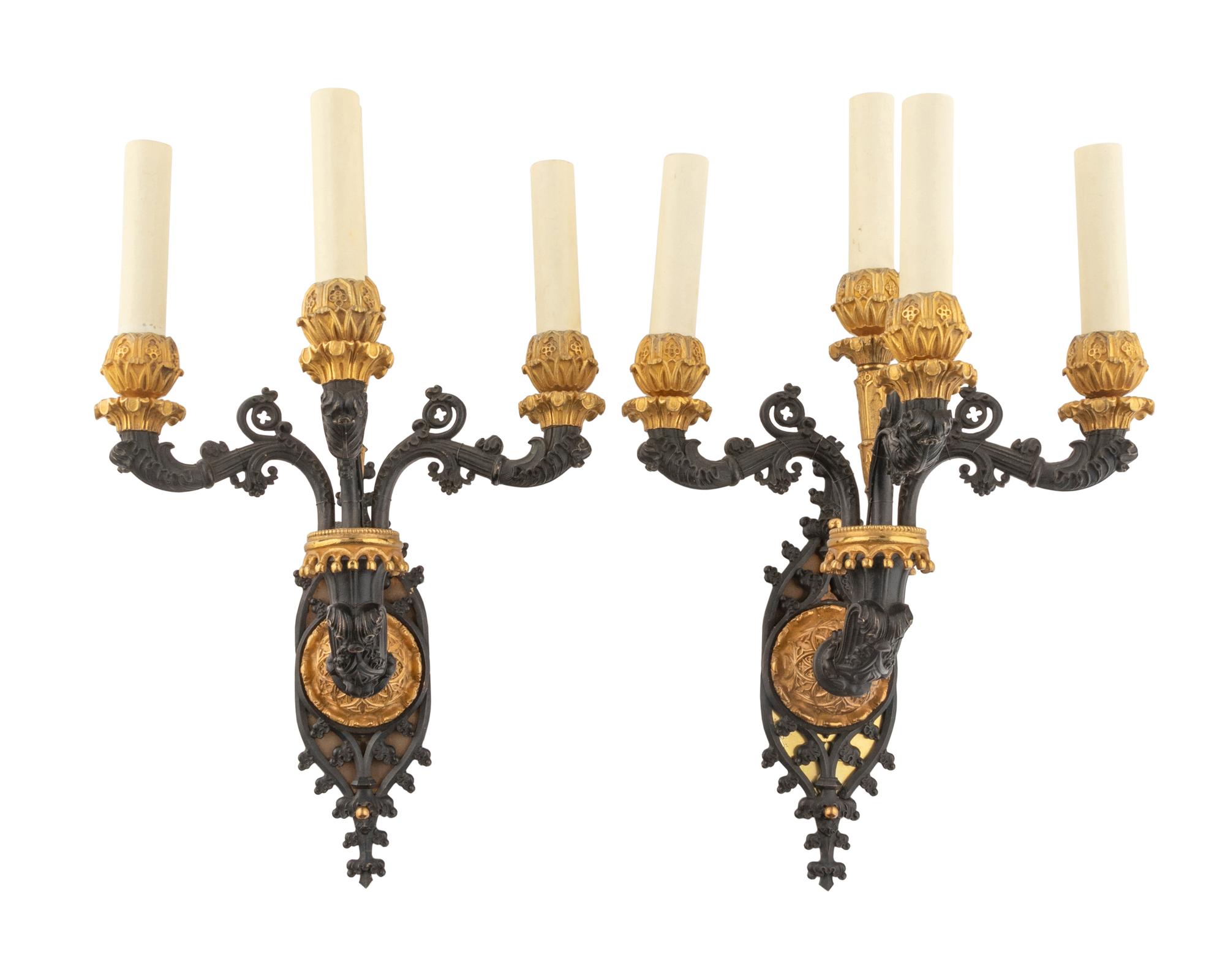 A Pair of Charles X Gilt and Patinated Bronze Four-Light Sconces