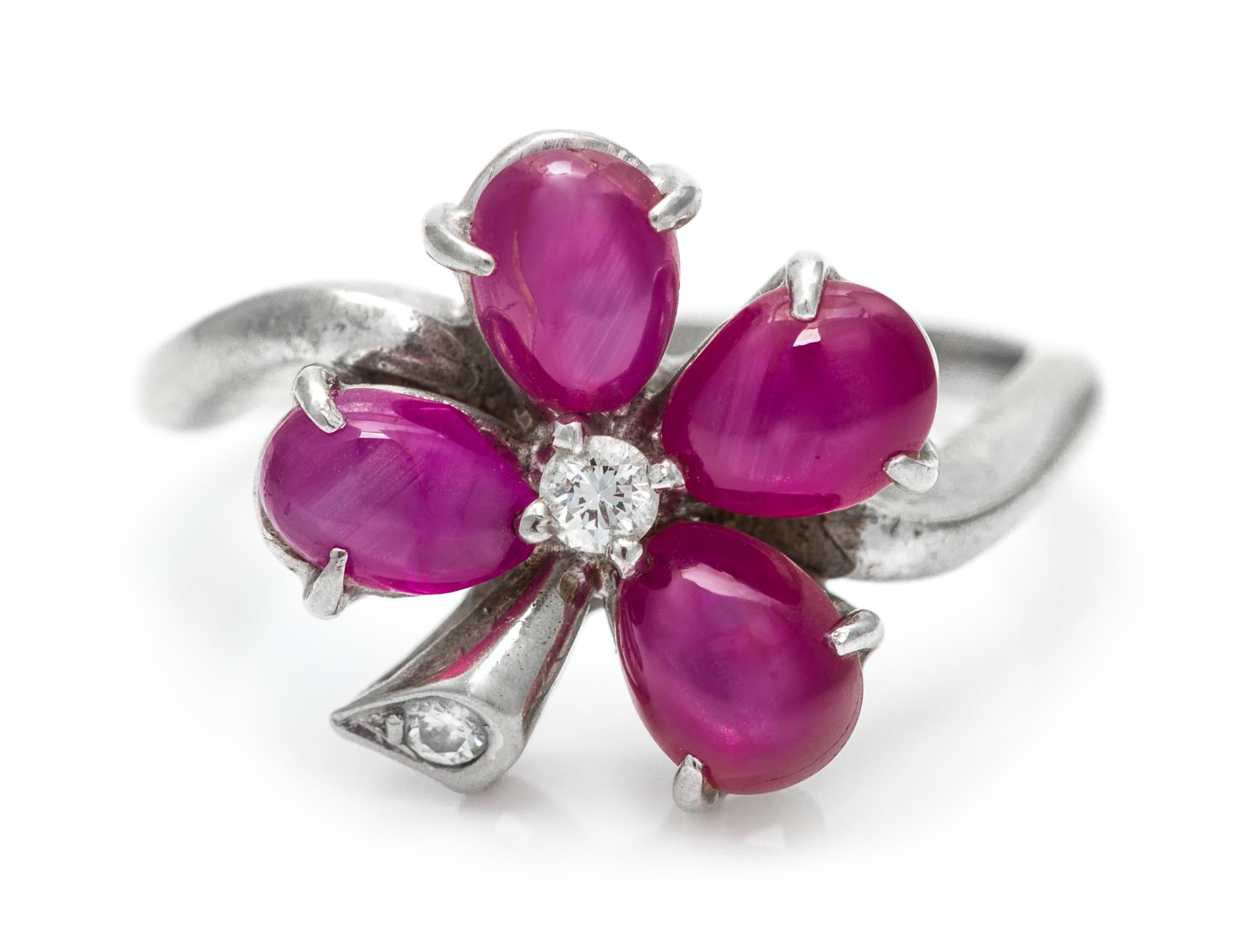 A White Gold, Star Ruby, and Diamond Clover Motif Ring, 2.50 dwts.