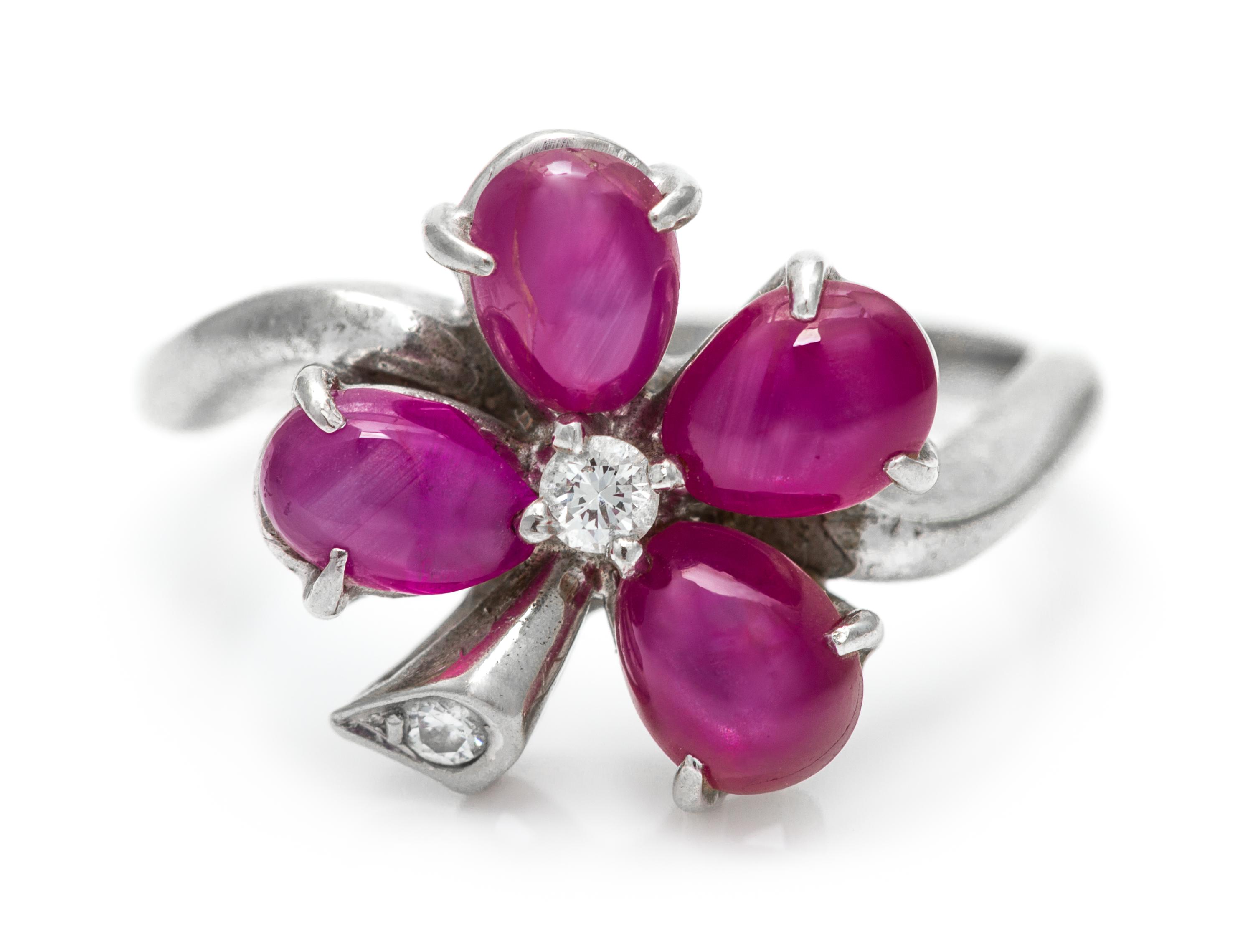 A White Gold, Star Ruby, and Diamond Clover Motif Ring, 2.50 dwts.