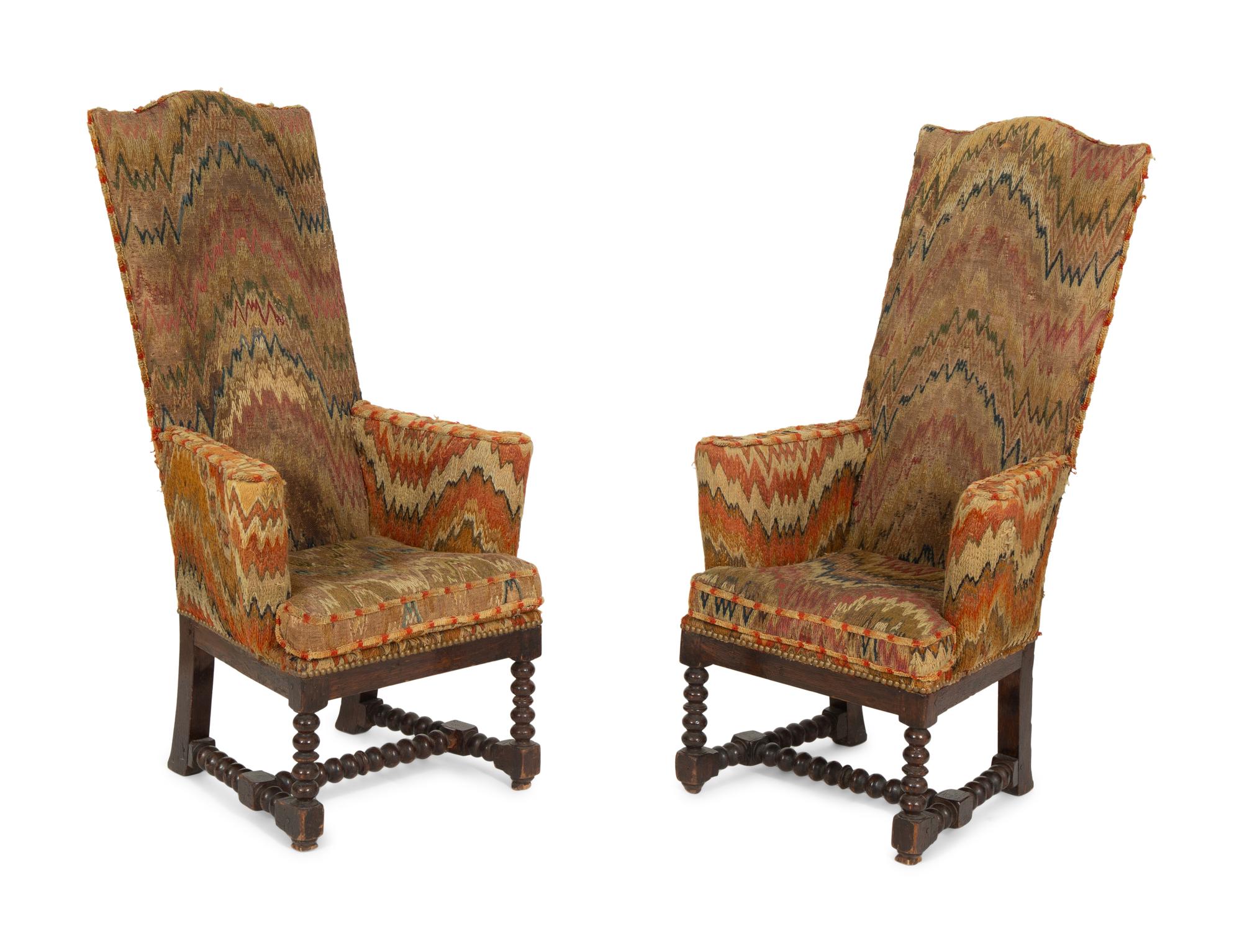 A Pair of Jacobean Style High Back Armchairs