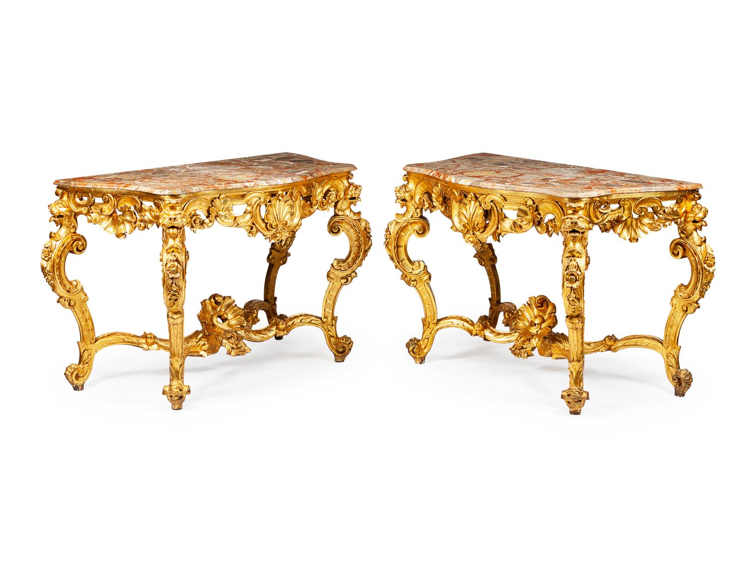 A Pair of Italian Parcel Gilt Console Tables