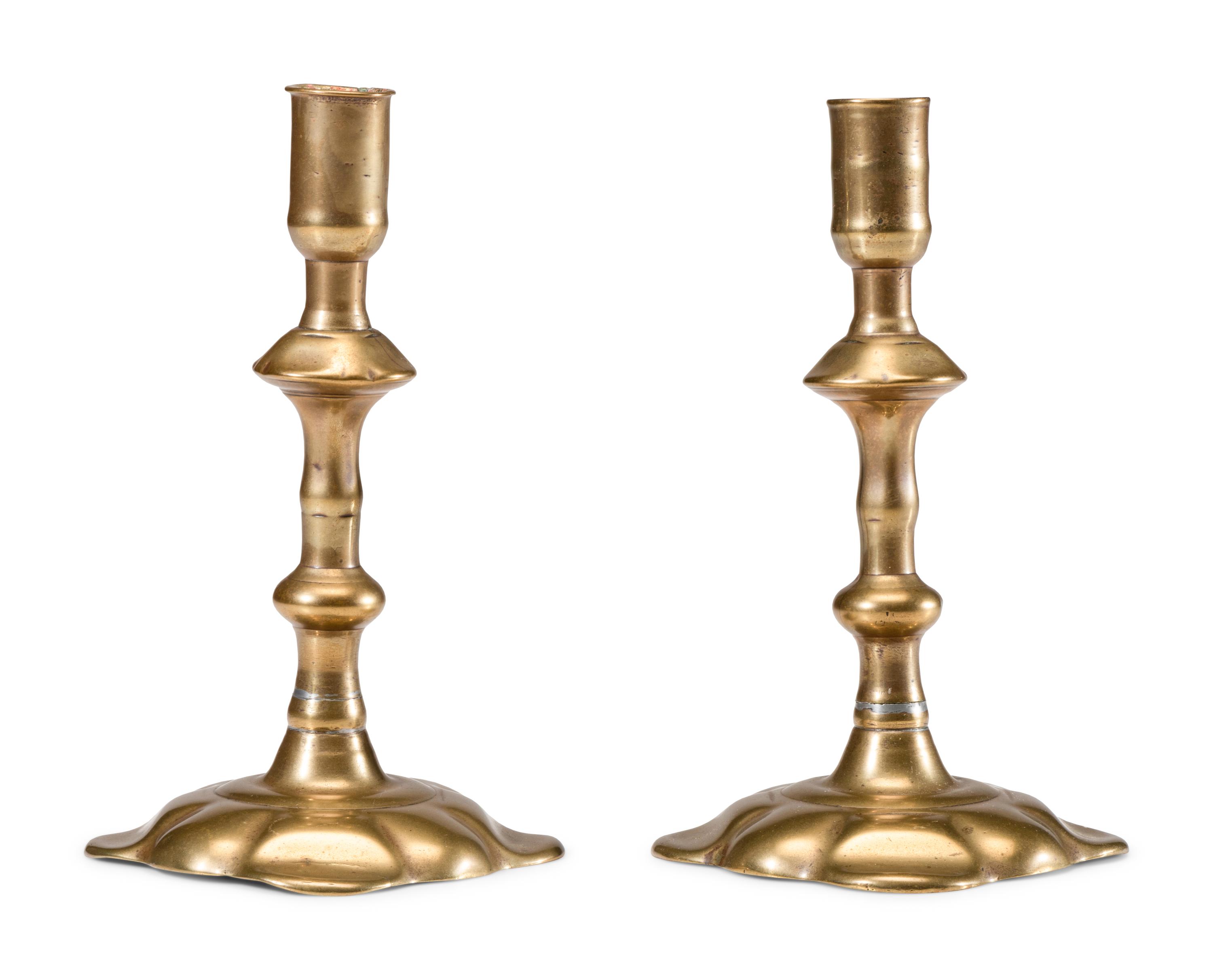 A Pair of English Brass Scalloped-Foot Candlesticks