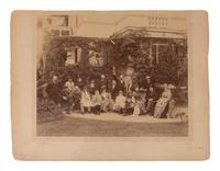 [ARTISTS]. Group portrait of artists incl. Frédéric Auguste Bartholdi posed as the Statue of Liberty. Paris: Banque & Co., ca 1880s.
